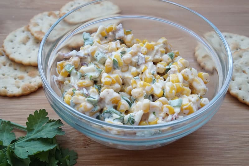 Combined ingredients for corn, bacon and jalapeno salad