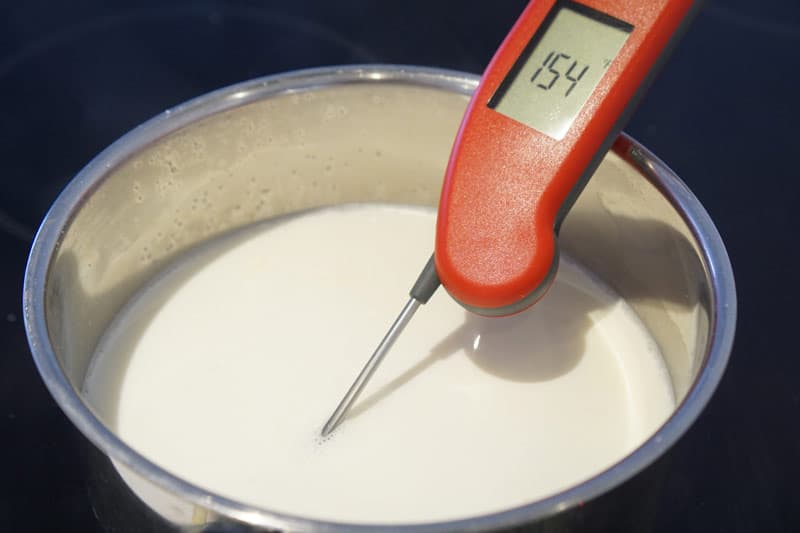 testing the temperature for milk