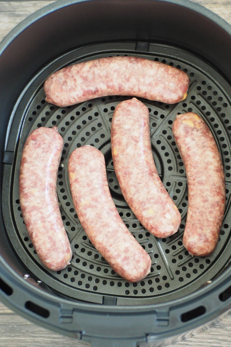 Raw Brats in the Air Fryer Basket