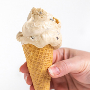 A cone of peanut butter chocolate chip ice cream