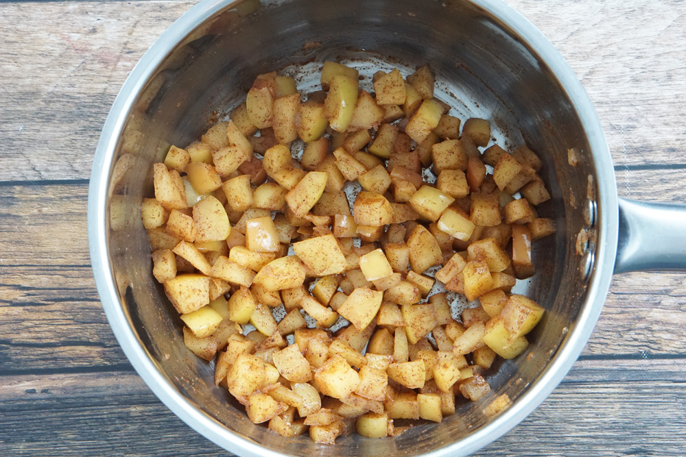 cooked apples in a pot