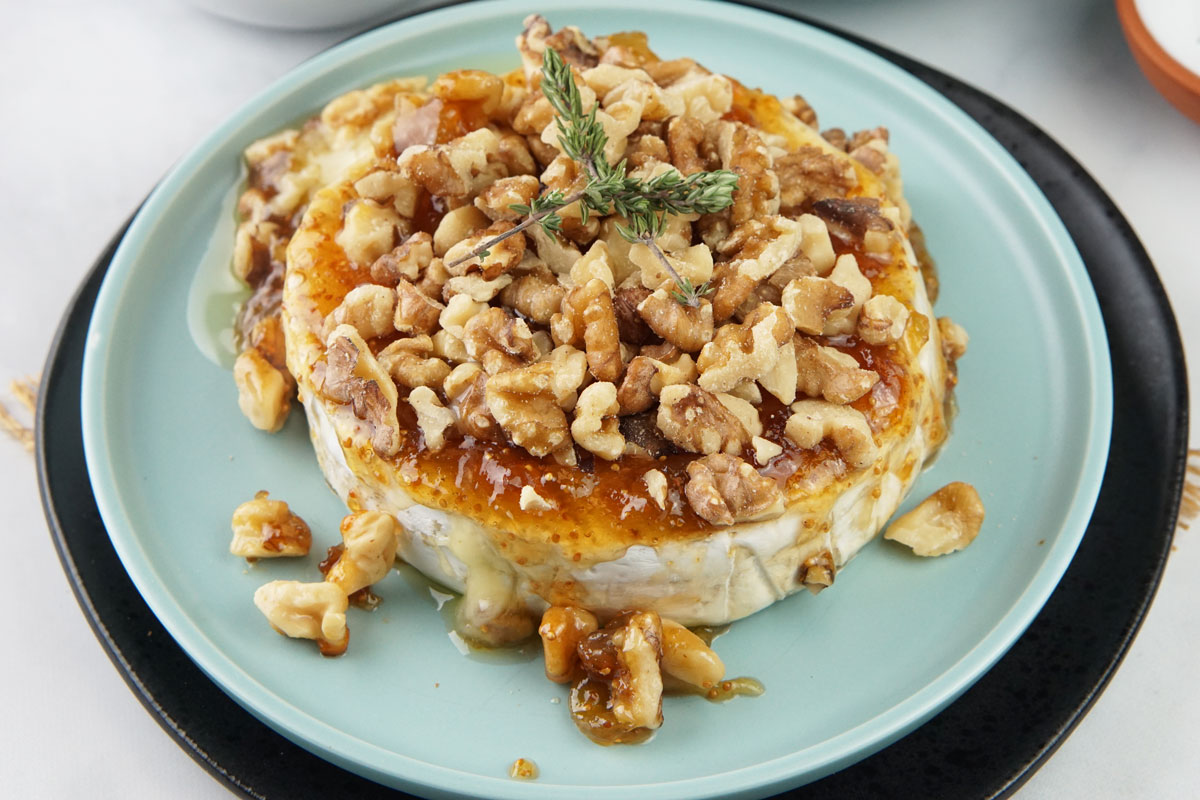 baked brie with fig jam and candied walnuts