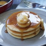 A stack of bananas foster pancakes