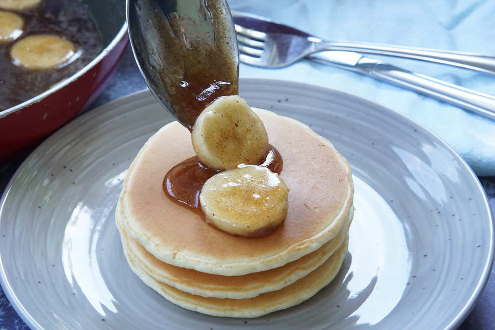 A stack of bananas foster pancakes