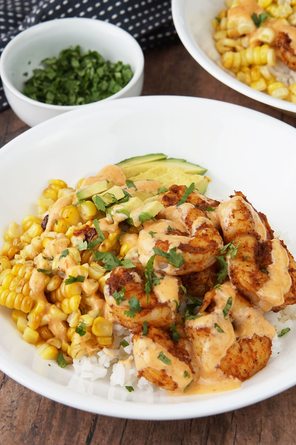 Bang bang shrimp, corn, and avocado bowl