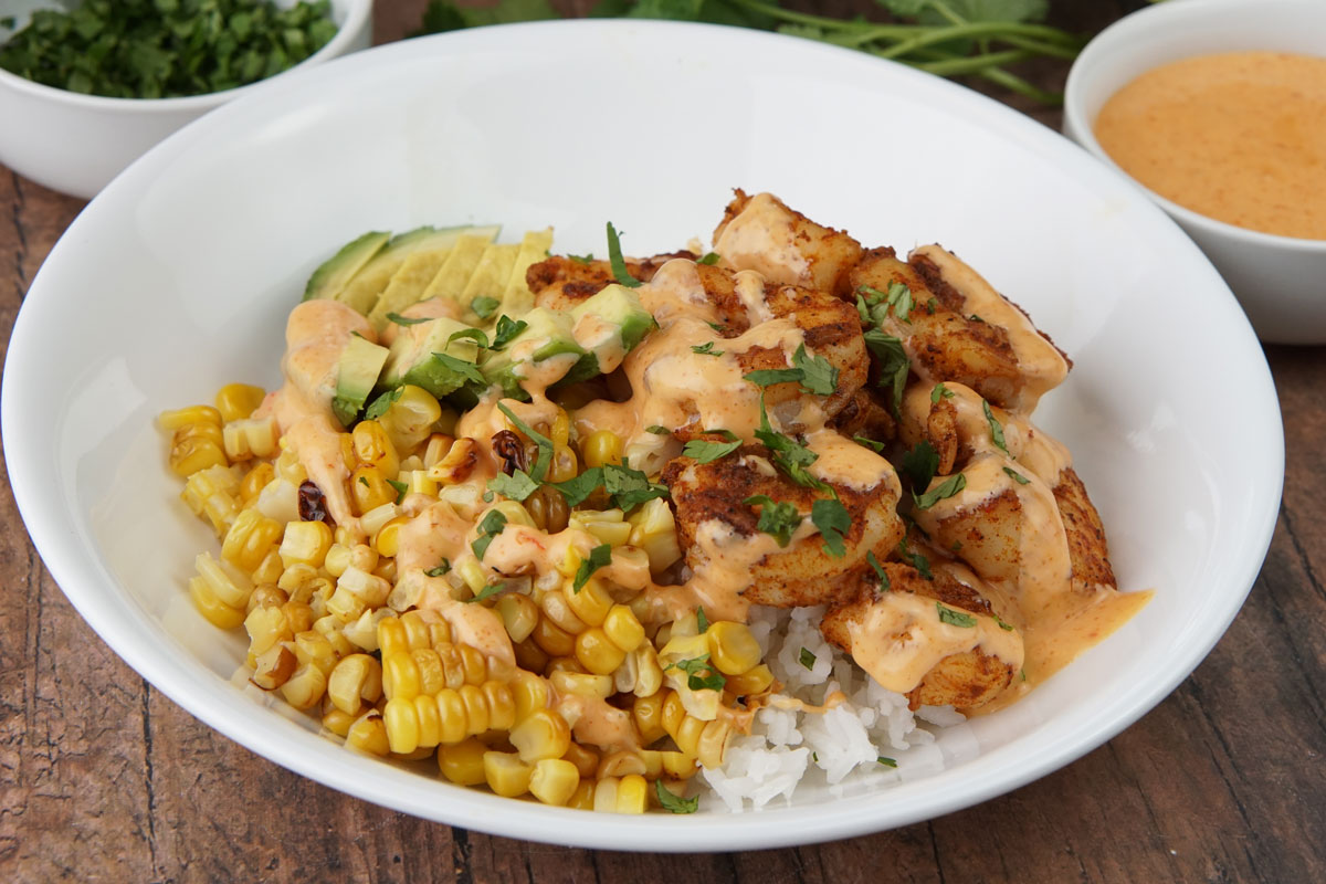 Bang bang shrimp, corn, and avocado bowl