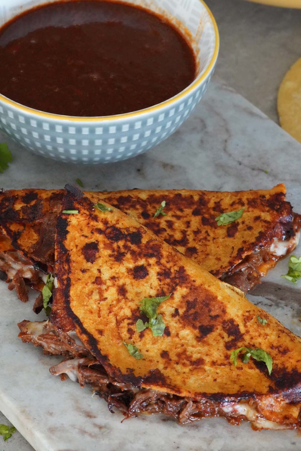 Birria tacos with consomme