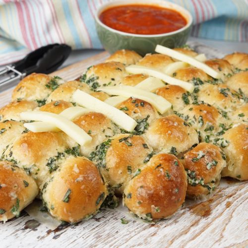 football shaped cheesy garlic bread