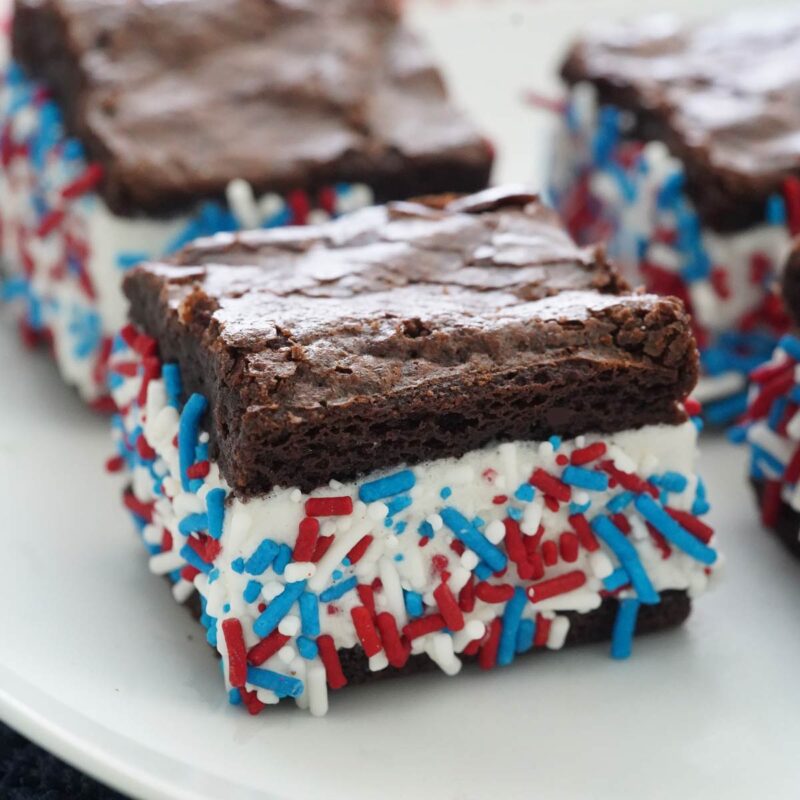 Brownie ice cream sandwich rolled in red, white, and blue sprinkles