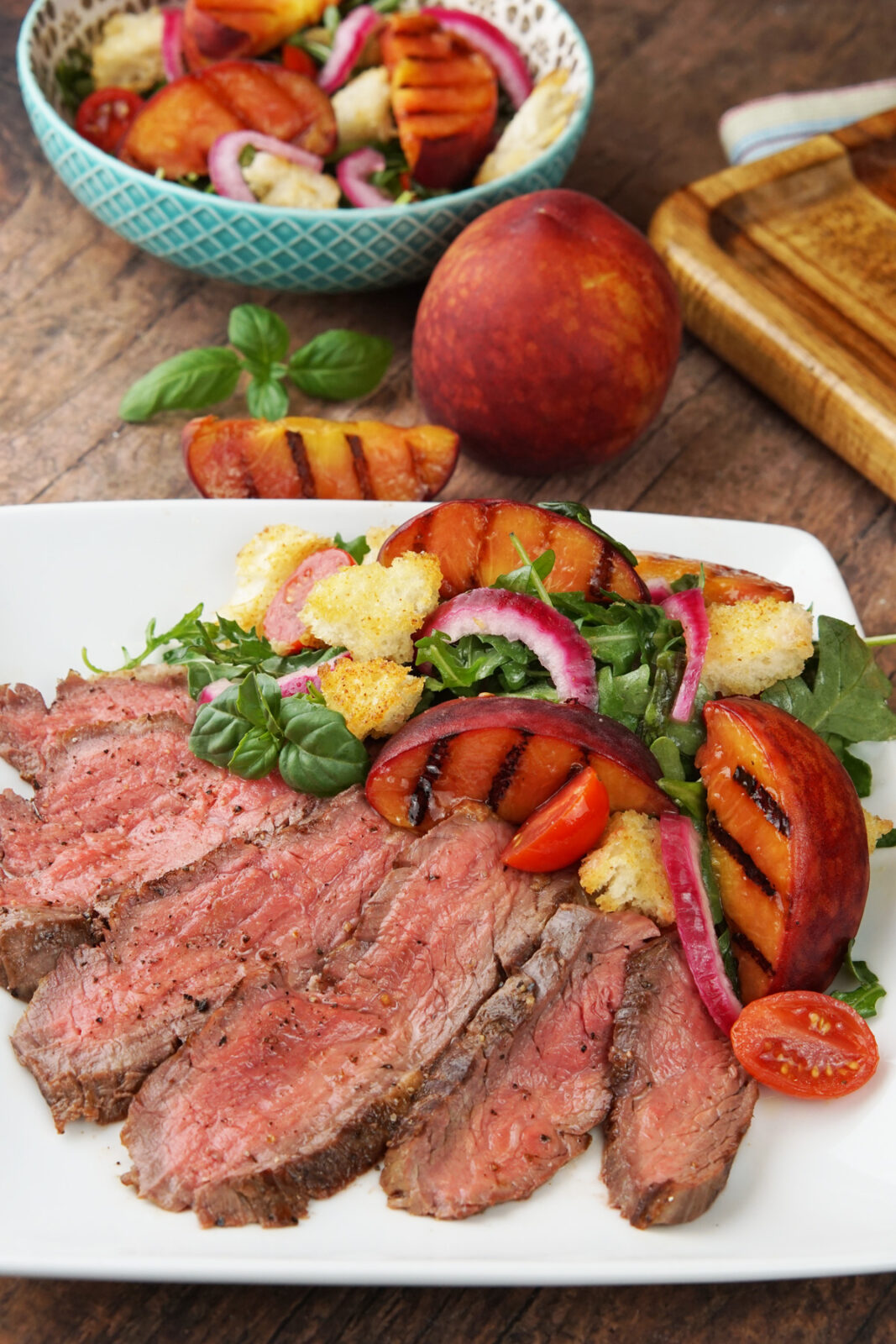 Flank steak with peach salad