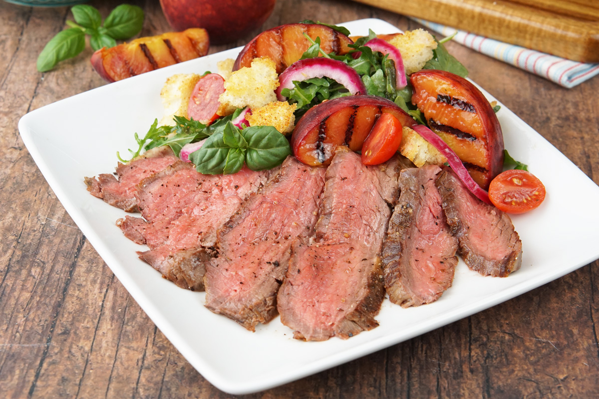 Flank steak with peach salad