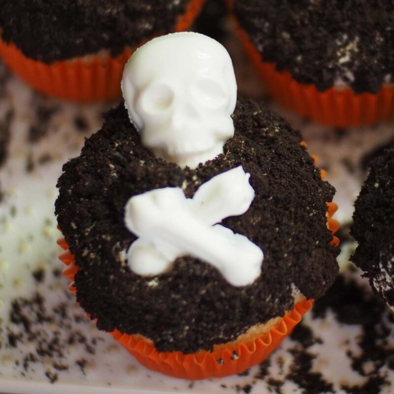 graveyard cupcakes with white chocolate skeletons.