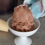 A bowl of chocolate ice cream.