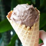 Chocolate protein ice cream in a cone