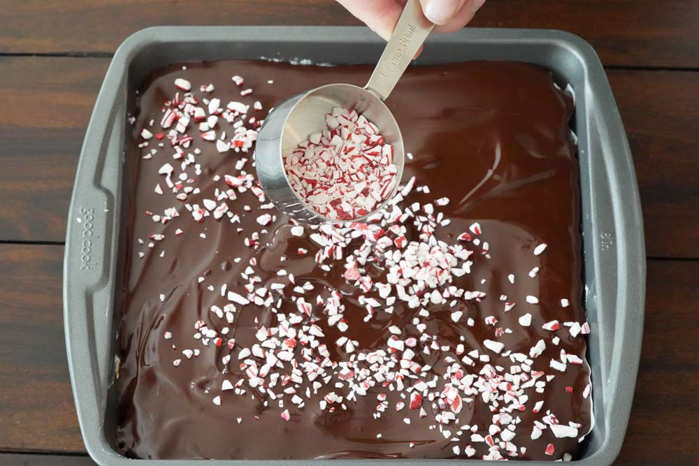 sprinkling on the crushed candy canes