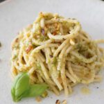 Pasta with pistachio pesto on a plate