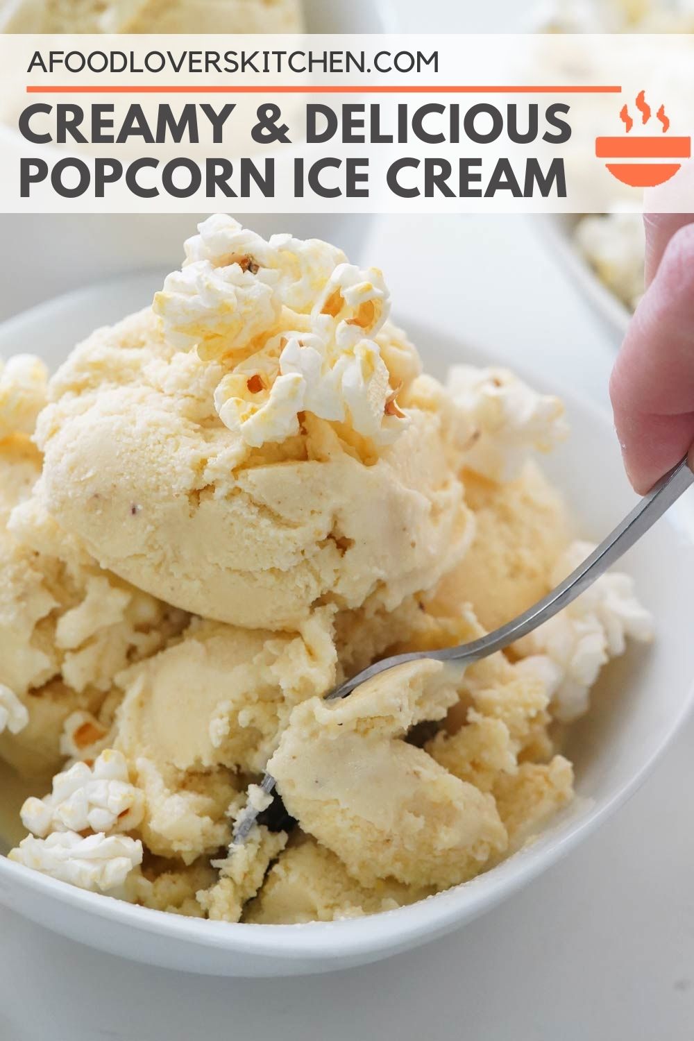 Popcorn ice cream in a bowl with popcorn on top