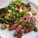 skirt steak with chimichurri and a pear and gorgonzola salad