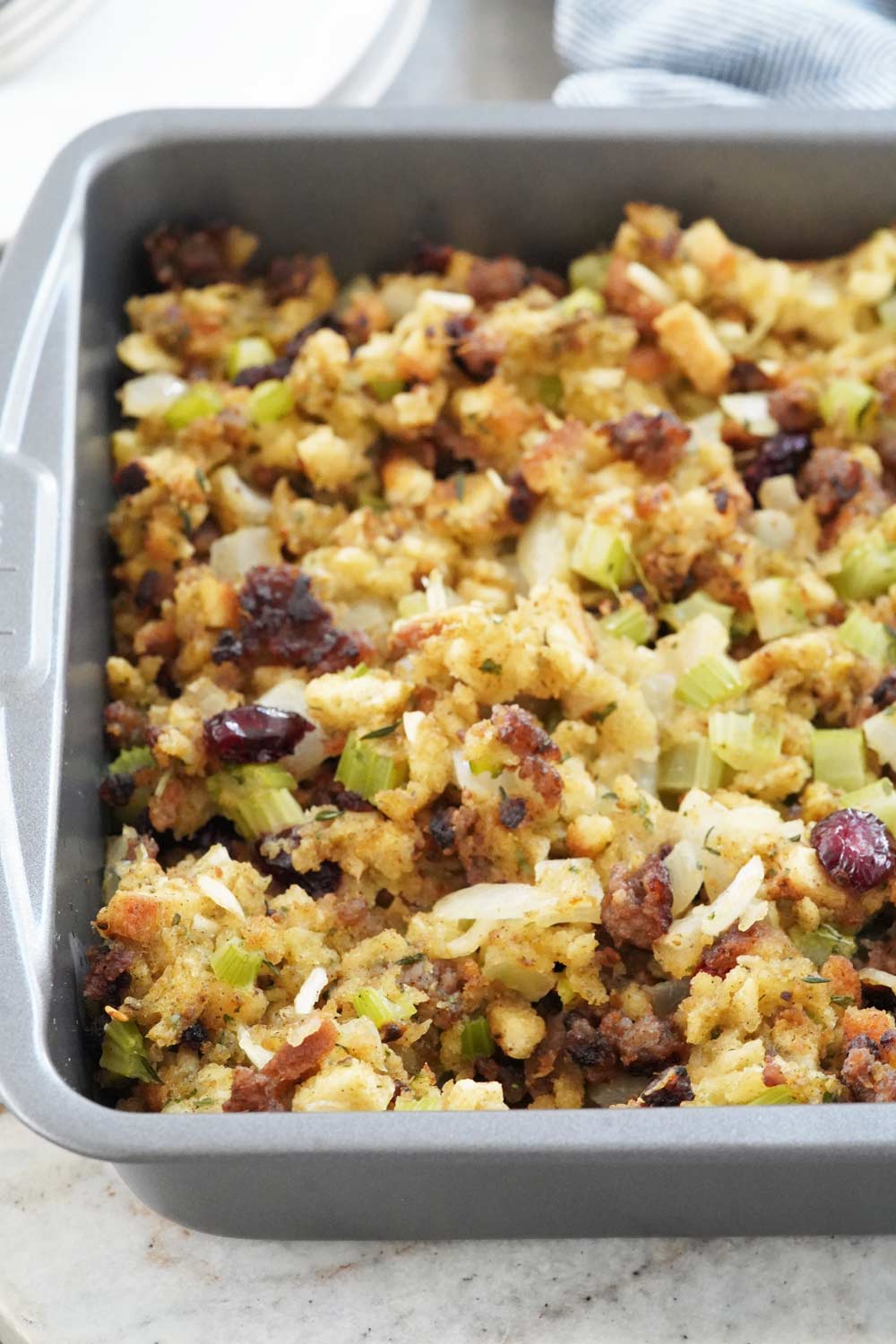 Smoked stuffing with sausage in a casserole dish.