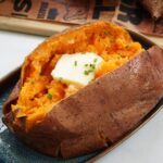 Sweet potato with melted butter and chives