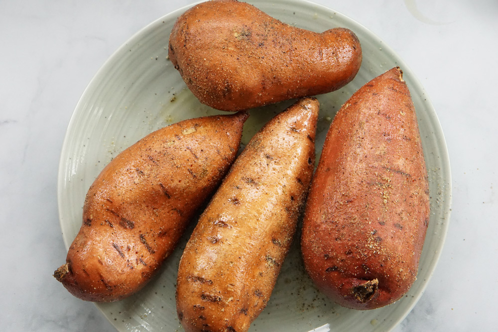 Raw sweet potatoes with seasoning