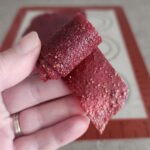 A roll of strawberry fruit leather.