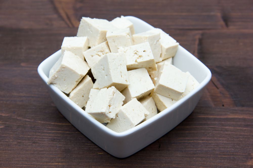 A bowl of tofu squares