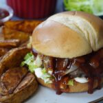 Whiskey BBQ glazed burgers with Cajun potato wedges